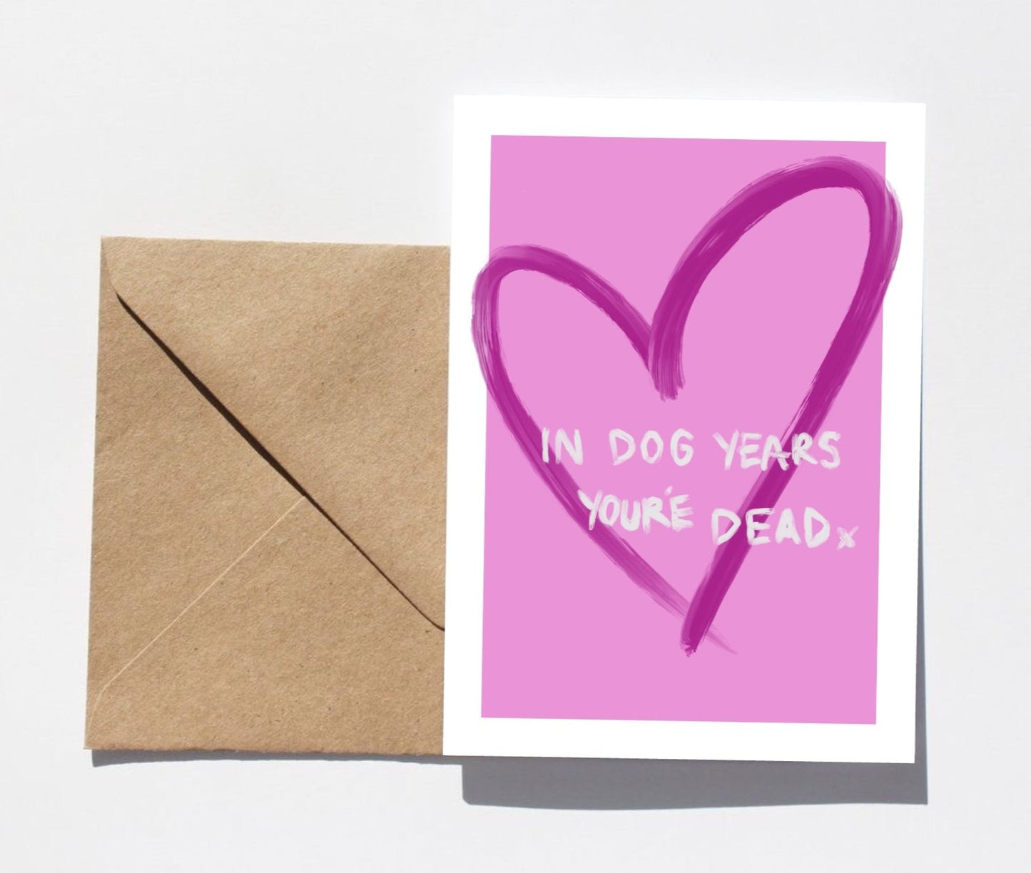 'In dog years you're dead' greetings card (pink)